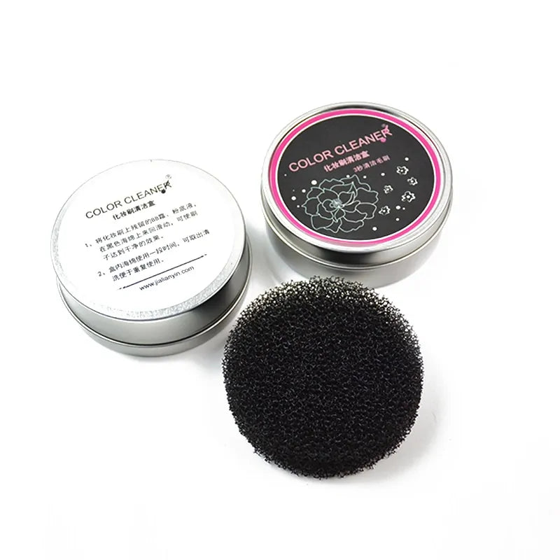 Silicone Makeup Brush Cleaner Mat Language next to two color cleaner tins for easy makeup brush maintenance.